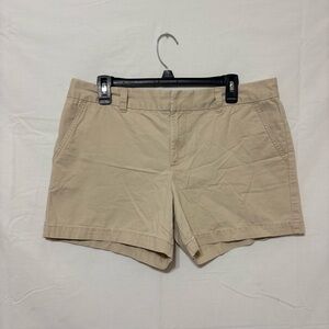 Khaki chino shorts with back welt pockets and a tailored fit.